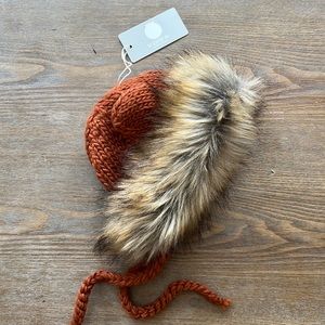 The Blueberry Hill lion hat 3-6 months.